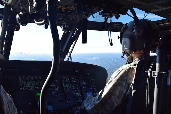 Warrant Officer 1 Craig Emmett, A UH-60 Black Hawk pilot with the Georgia Army National Guard’s Marietta-based 78th Aviation Troop Command flies personnel of the Ga. Department of Defense, American Red Cross and the Georgia Emergency Management Agency to Seminole County, Ga. Georgia National Guard flights have provided valuable aerial assessment of hurricane impacted counties and provided state and Federal agencies with situational awareness of conditions on the ground following Hurricane Michael. Georgia Army National Guard photo by Maj. William Carraway / released