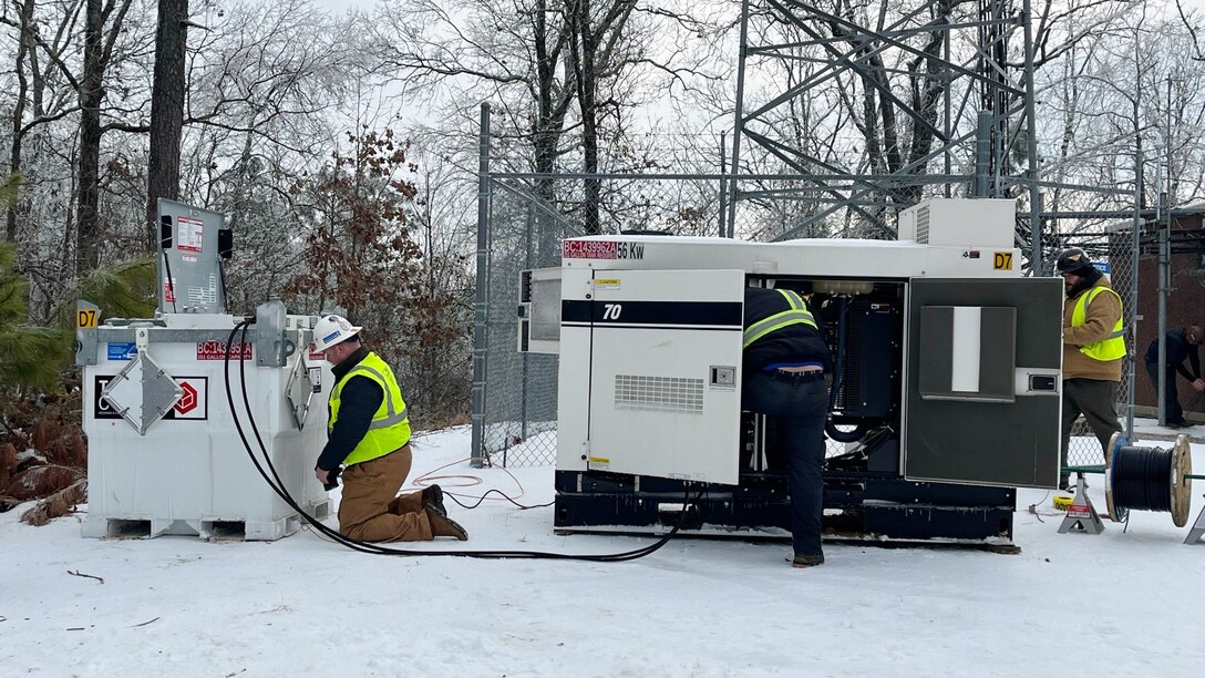 A power team from the U.S. Army Corps of Engineers Tulsa District works to install a power generator at a communications tower in Bethel Springs, Tennessee, Jan. 29, 2026, to ensure first responders can communicate and coordinate recovery efforts. The USACE Nashville District’s emergency managers are supporting this effort as part of a FEMA mission assignment with Task Force Temporary Emergency Power. (USACE Photo by Matt Phelan)