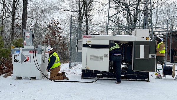 A power team from the U.S. Army Corps of Engineers Tulsa District works to install a power generator at a communications tower in Bethel Springs, Tennessee, Jan. 29, 2026, to ensure first responders can communicate and coordinate recovery efforts. The USACE Nashville District’s emergency managers are supporting this effort as part of a FEMA mission assignment with Task Force Temporary Emergency Power. (USACE Photo by Matt Phelan)