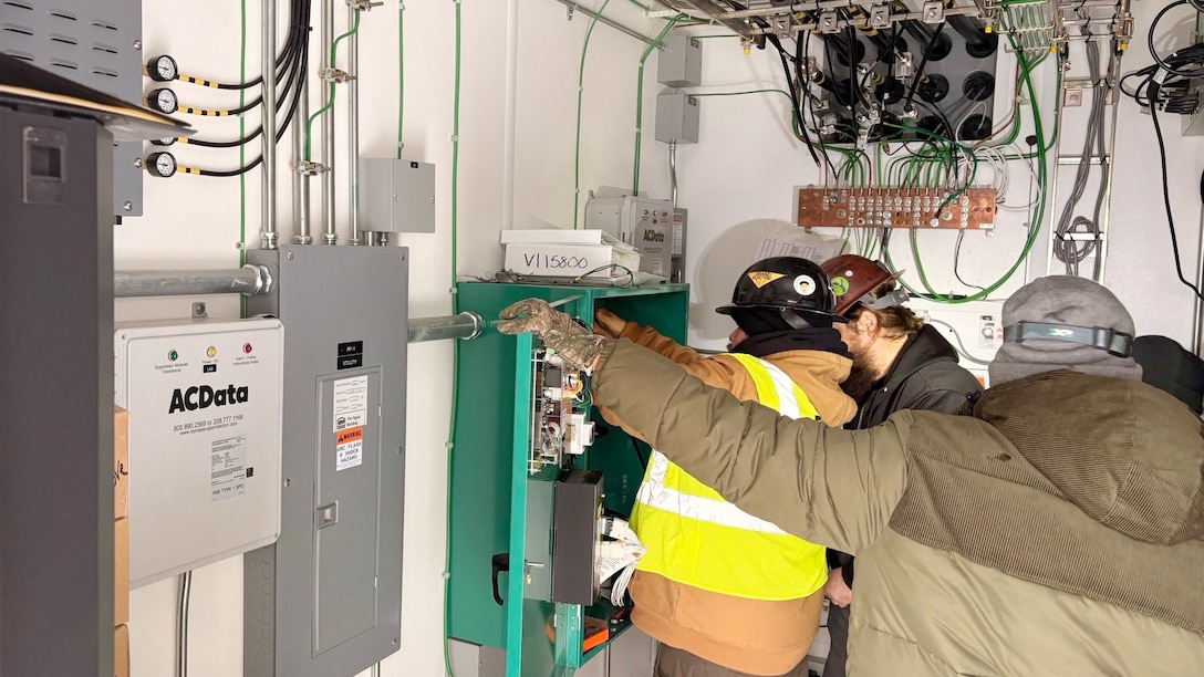 A power team from the U.S. Army Corps of Engineers Tulsa District works to connect power from a generator at a communications tower in Bethel Springs, Tennessee, Jan. 29, 2026, to ensure first responders can communicate and coordinate recovery efforts. The USACE Nashville District’s emergency managers are supporting this effort as part of a FEMA mission assignment with Task Force Temporary Emergency Power. (USACE Photo by Matt Phelan)