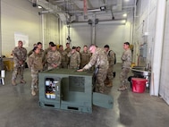 Army Reserve Soldiers with 380th Hospital Center build power-generator skills essential to readiness