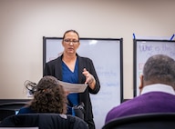 Mindy Bickal, program integrator at the U.S. Army Aviation and Missile Command’s Business Transformation Office, discusses operational procedures during an Organizational Structure Management workshop at Toftoy Hall on Redstone Arsenal, Alabama. The workshops, held Jan. 5–13, focused on financial accountability, organizational constraints, and modernizing core business processes.