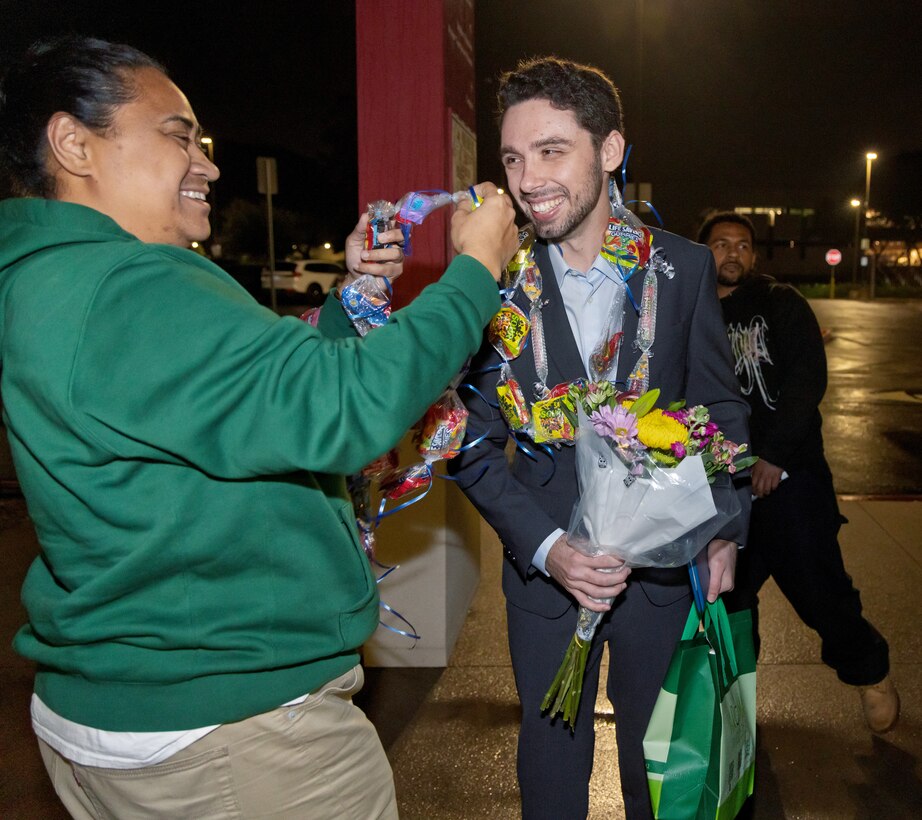 Trent Michel, marine electrician, Puget Sound Naval Shipyard & Intermediate Maintenance Facility San Diego Detachment, receives a congratulatory lei, Jan. 22, 2026, following the 2026 Southwest Regional Apprentice Program graduation ceremony at Southwestern College, Chula Vista, Calif. (U.S. Navy photo by Wendy Hallmark)