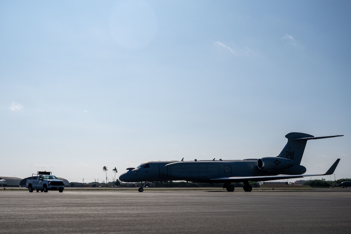 A U.S. Air Force EA-37B Compass Call, assigned to the 55th Electronic Combat Group, prepares to depart the flight line on Joint Base Pearl Harbor-Hickam, Hawaii, Dec. 13, 2025. The 55th Wing launched a roadshow in the Indo-Pacific, showcasing the EA-37B’s strategic role in delivering electromagnetic spectrum dominance and its contributions to regional stability. (U.S. Air Force photo by Airman 1st Class Aden Brown)