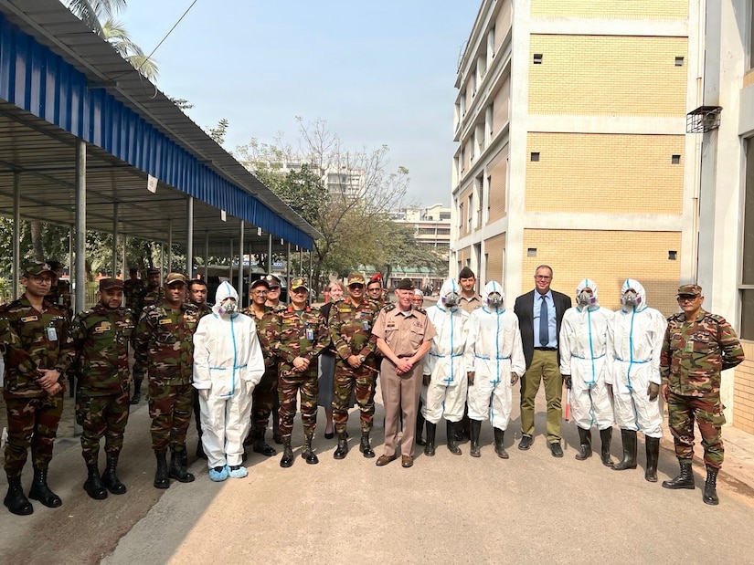 U.S. Army Maj. Gen. E. Darrin Cox, 18th Theater Medical Command commander, stands with Bangladeshi military and medical personnel following a chemical, biological, radiological, and nuclear (CBRN) medical response demonstration in Sylhet, Bangladesh, Jan. 21, 2026.