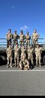Airmen assigned to the 48th Aerial Port Squadron pose for a group photo at Joint Base Pearl Harbor-Hickam, Hawaii, Nov. 13, 2025.