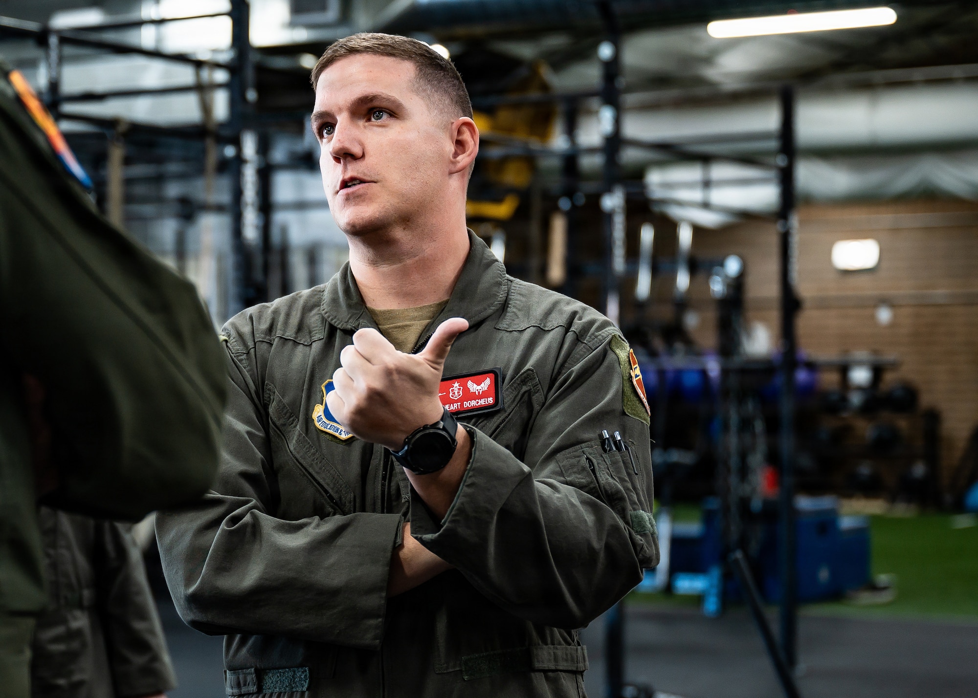 U.S. Air Force Tech. Sgt. Joshua Dorcheus, 56th Fighter Wing human performance team flight chief, briefs Airmen inside the Tactical Integrated Training and Assessment Nexus, Jan. 29, 2026, at Luke Air Force Base, Arizona. TITAN provides specialized training and performance optimization to develop resilient, mission-ready fighter pilots capable of operating in high-end combat environments. (U.S. Air Force photo by Airman 1st Class Belinda Guachun-Chichay)