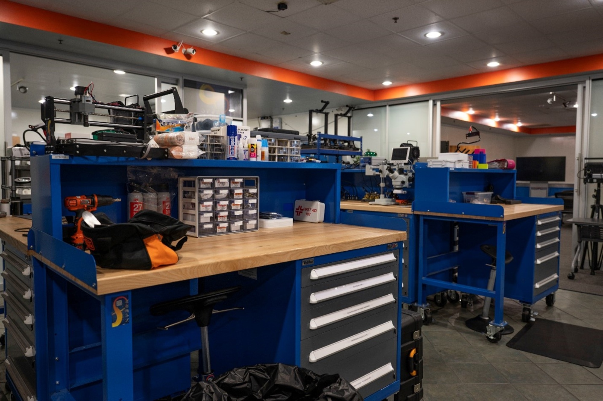 U.S. Air Force Mission Enhancement Cell workstations are used to assemble 3D printed pieces at Joint Base McGuire-Dix-Lakehurst, N.J., Nov. 5, 2025. Focused on empowering warfighters, the MEC provides relentless innovation to solve common problems that might hinder mission readiness. (U.S. Air Force photo by Airman 1st Class Luisa E. Dugan)