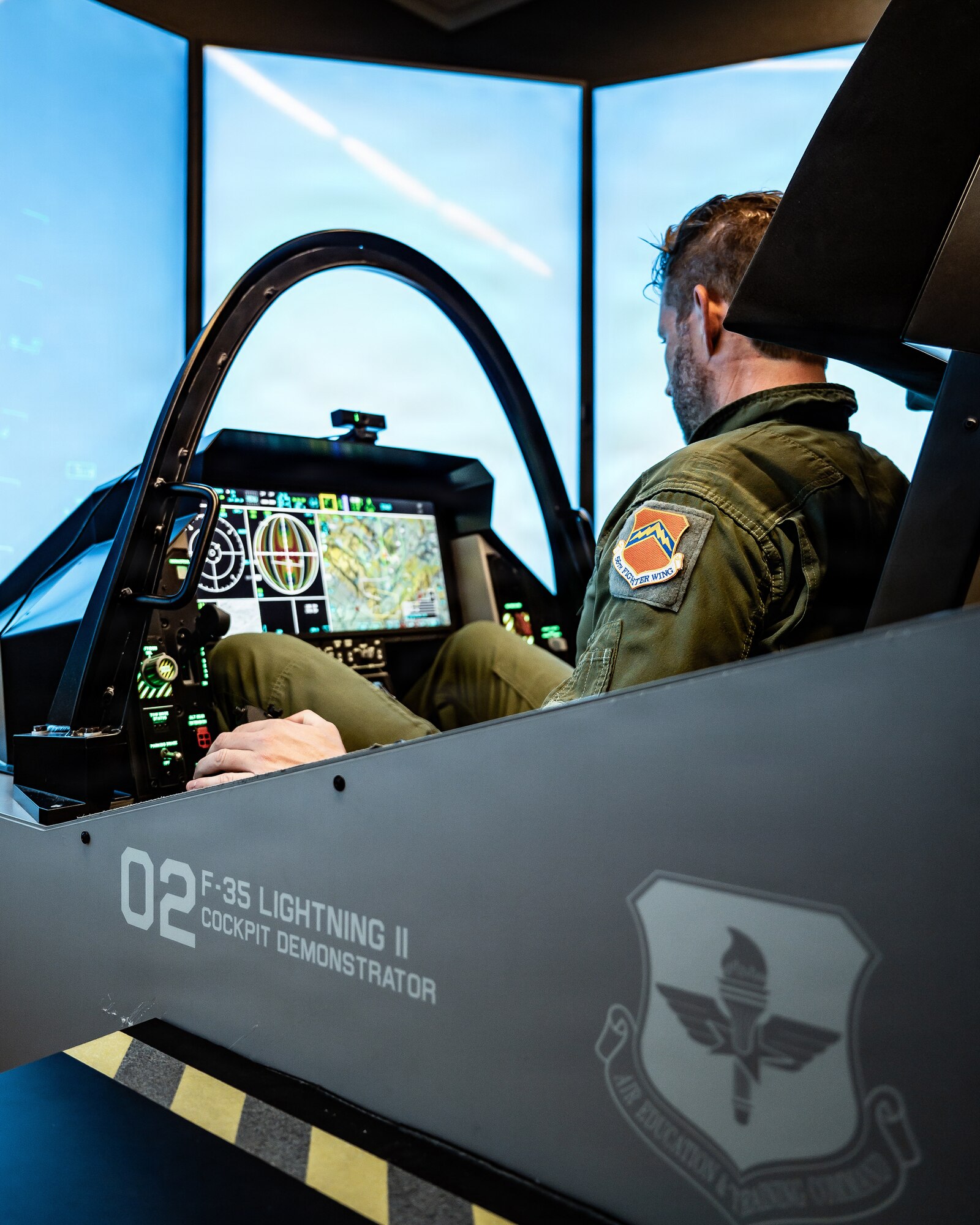 Mr. Eric Trump experiences an F-35A Lightning II simulator, Jan. 29, 2026, at Luke Air Force Base, Arizona. The simulator supports realistic, mission-relevant training that enables fourth- and fifth-generation integration and prepares pilots for complex combat scenarios. (U.S. Air Force photo by Airman 1st Class Belinda Guachun-Chichay)