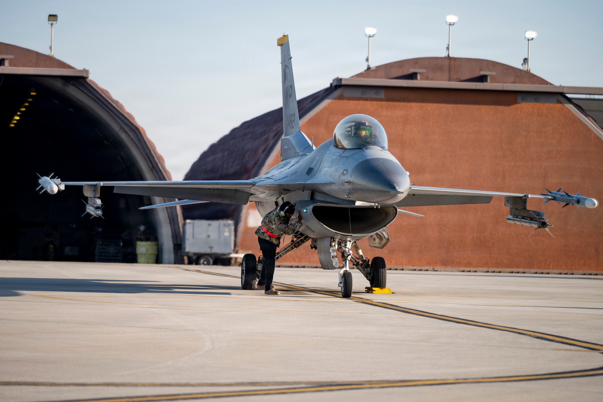 A U.S. Air Force maintainer assigned to the 51st Maintenance Group, performs postflight checks on a U.S. Air Force F-16 Fighting Falcon assigned to the 36th Fighter Squadron after a flying surge at Osan Air Base, Republic of Korea, Jan. 28, 2026.