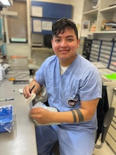 260124-N-FT324-1226. ROTA, Spain (Jan. 24, 2026) Hospital Corpsman 3rd Class Irvin Gonzalez, a native of Mission, Texas, assigned to Navy Medicine Readiness and Training Command Rota, fabricates a dental appliance in the dental laboratory, Jan. 24, 2026. Gonzalez supports the health, readiness and morale of Sailors and Marines by creating crowns, veneers and other dental restorations that contribute to operational readiness. (U.S. Navy photo by Captain Michael Mercado)