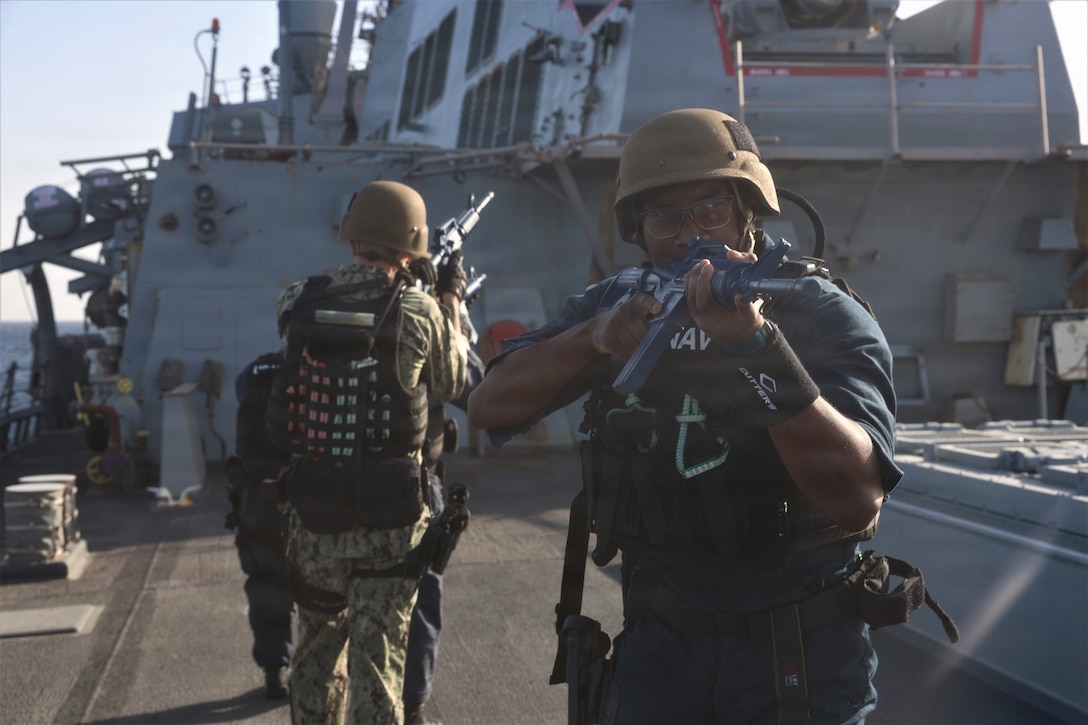 U.S. CENTRAL COMMAND AREA OF RESPONSIBILITY (Jan. 22, 2026) U.S. Navy Fire Controlman (Aegis) 2nd Class Tendai Mbiza participates in visit, board, search and seizure tactical team training aboard the Arleigh Burke-class guided-missile destroyer USS McFaul (DDG 74). McFaul is deployed to the U.S. 5th Fleet area of operations to support maritime security and stability in the U.S. Central Command area of responsibility. (U.S. Navy photo by Mass Communication Specialist 2nd Class Gabriel Fields)