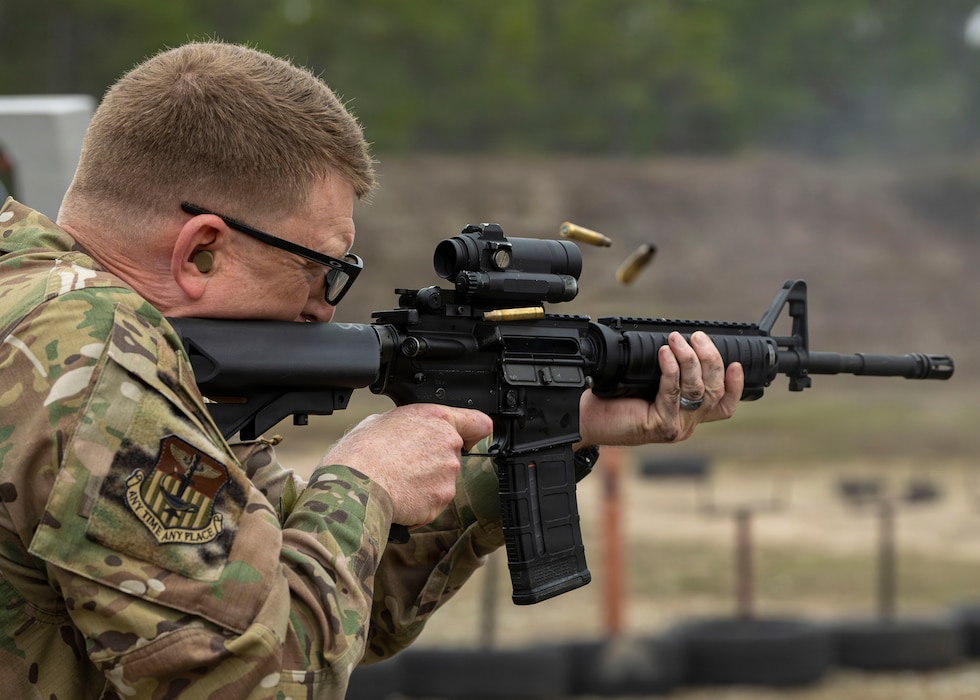 Airman firing M4