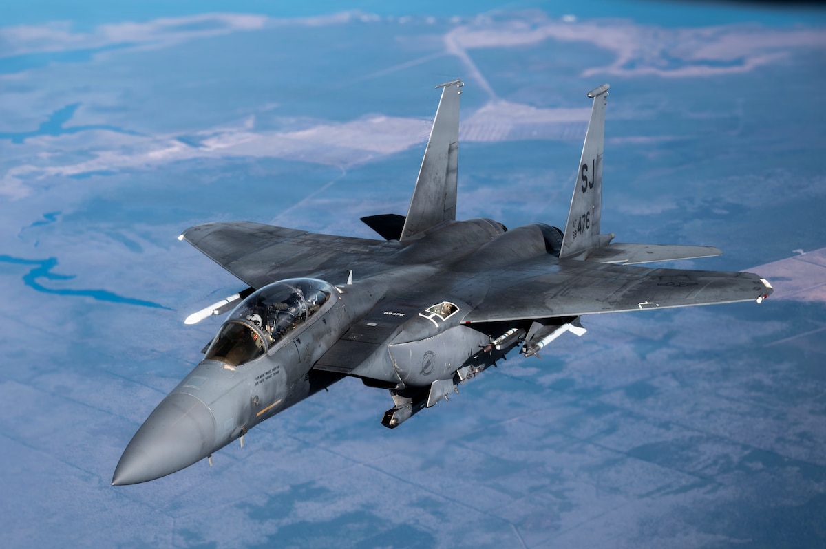 An F-15E Strike Eagle assigned to the 4th Fighter Wing approaches a KC-135 Stratotanker from the 121st Air Refueling Wing for aerial refueling over North Carolina, Jan. 22, 2026. Aerial refueling extends the F-15E’s ability to conduct air-to-air and air-to-ground missions in support of training and operational requirements. (U.S. Air National Guard photo by Airman Samir Harris)