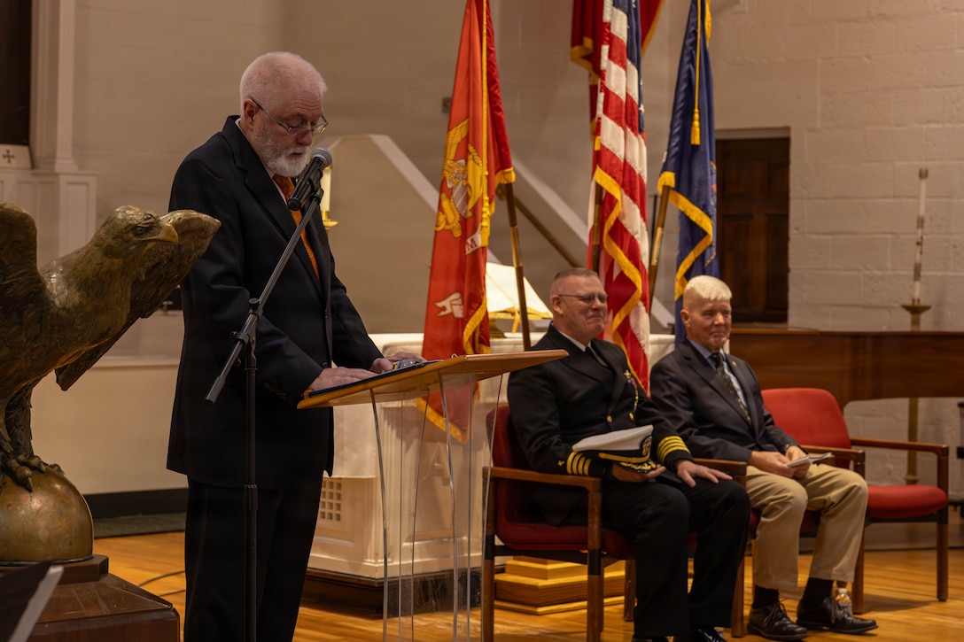 Retired U.S. Navy Cmdr. Carol P. Koch delivers remarks honoring U.S. Navy Capt. William S. Riley, command chaplain for Marine Corps Installations-East, during his retirement ceremony, at Marine Corps Base Camp Lejeune, North Carolina, Jan. 26, 2026. Capt. Riley served in a wide range of duty assignments across the United States and overseas, including operational and leadership roles supporting Marines and Sailors. Riley concluded his military service in 2026 as the command chaplain for Marine Corps Installations East. (U.S. Marine Corps photo by Lance Cpl. Erica S. Padgett)