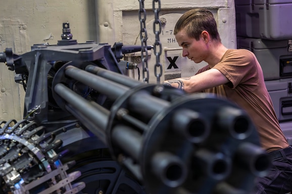 U.S. CENTRAL COMMAND AREA OF RESPONSIBILITY (Jan. 27, 2026) U.S. Navy Aviation Ordnanceman 3rd Class Gabriel Marshall conducts maintenance on an M61A2 gatling gun aboard the Nimitz-class aircraft carrier USS Abraham Lincoln (CVN 72) in the U.S. Central Command (CENTCOM) area of responsibility, Jan 27. Abraham Lincoln is deployed to the U.S. 5th Fleet area of operations to support maritime security and stability in the CENTCOM area of responsibility. (U.S. Navy photo by Mass Communication Specialist Seaman Samuel Evarts)