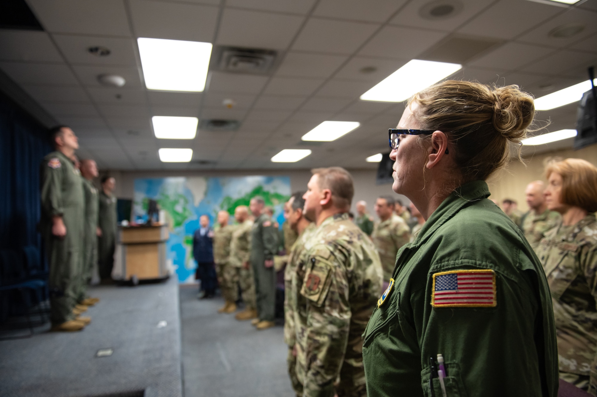 Members of the 123rd Airlift Wing stand at attention during a change-of-command ceremony at the Kentucky Air National Guard Base in Louisville, Ky., Dec. 14, 2025. Lt. Col. Josh Ketterer replaced Col. Randall Hood as 123rd Operations Group commander during the event. (U.S. Air National Guard photo by Tech. Sgt. Chloe Ochs)