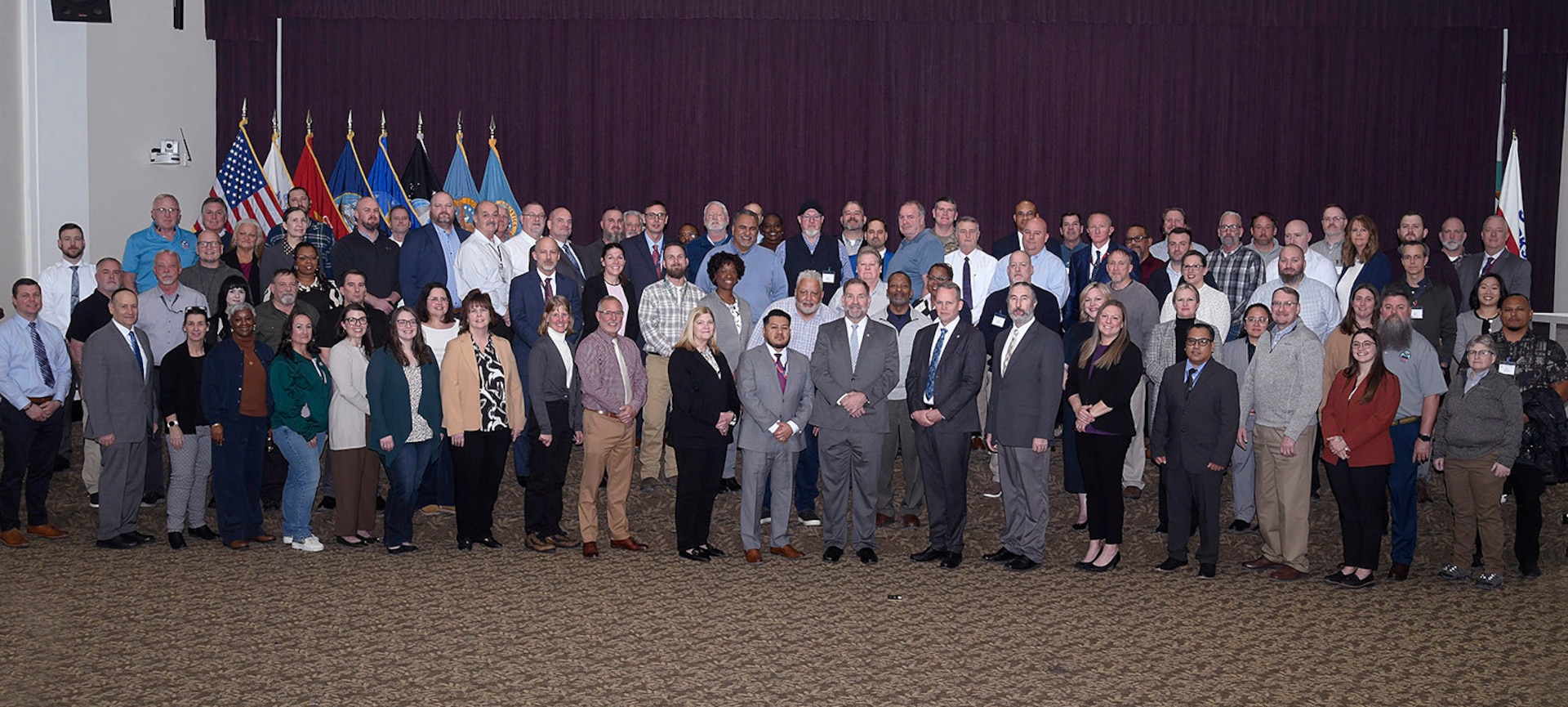 A group photo of people on risers.