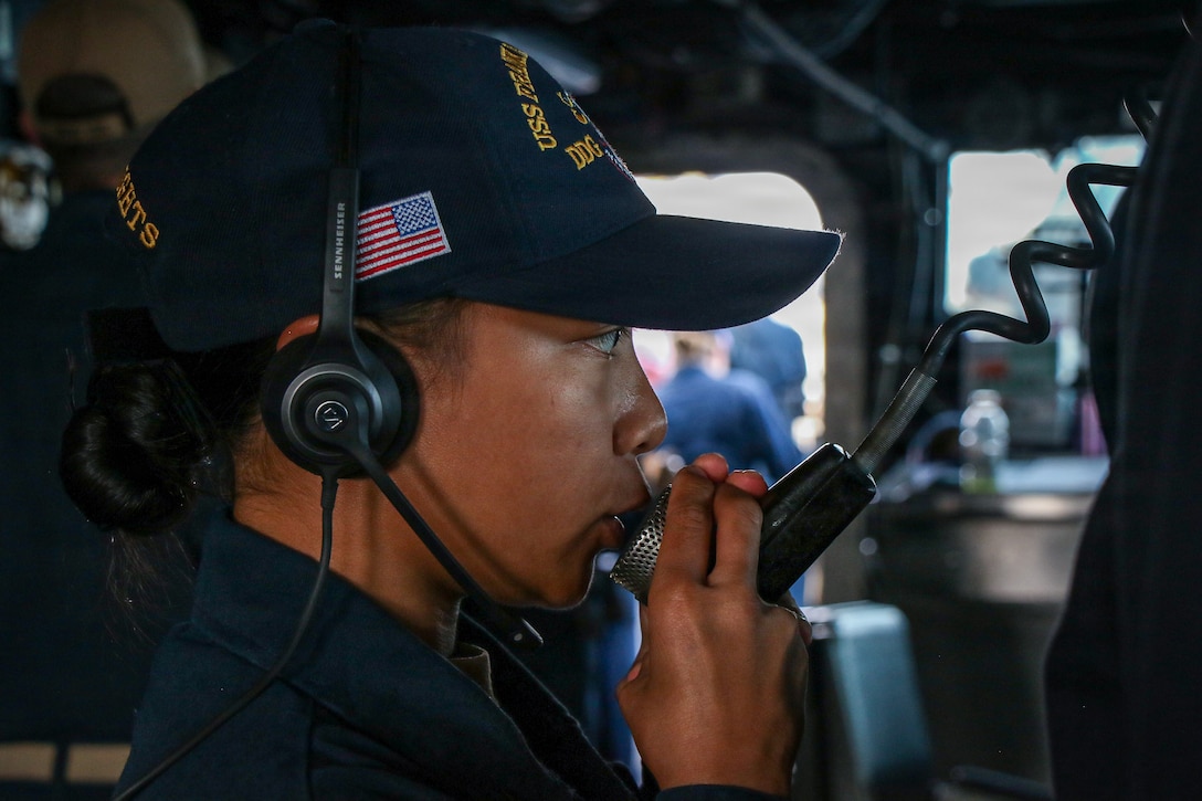 U.S. CENTRAL COMMAND AREA OF RESPONSIBILITY (Jan. 26, 2026) U.S. Navy Ensign Jewel Maigue maintains bridge-to-bridge contact in the bridge of Arleigh Burke-class guided-missile destroyer USS Frank E. Petersen Jr. (DDG 121) during a replenishment-at-sea with Henry J. Kaiser-class fleet replenishment oiler USNS Henry J. Kaiser (T-AO-187) in the U.S. Central Command (CENTCOM) area of responsibility. Frank E. Petersen Jr. is deployed to the U.S. 5th Fleet area of operations to support maritime security and stability in the CENTCOM area of responsibility. (U.S. Navy photo by Mass Communication Specialist 2nd Class Christian Kibler)