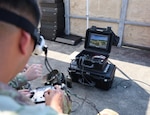 A Soldier flies a small unmanned aerial system at the range during the inaugural Unmanned Advanced Lethality Course (UALC) at Fort Rucker on August 18. DLA Troop Support is supporting DoW’s mission through a new Drone Marketplace that provides an efficient, reliable and secure place for customers to purchase Unmanned Ariel Systems. (Photo Credit: 2nd Lt. Veronica Jordan)