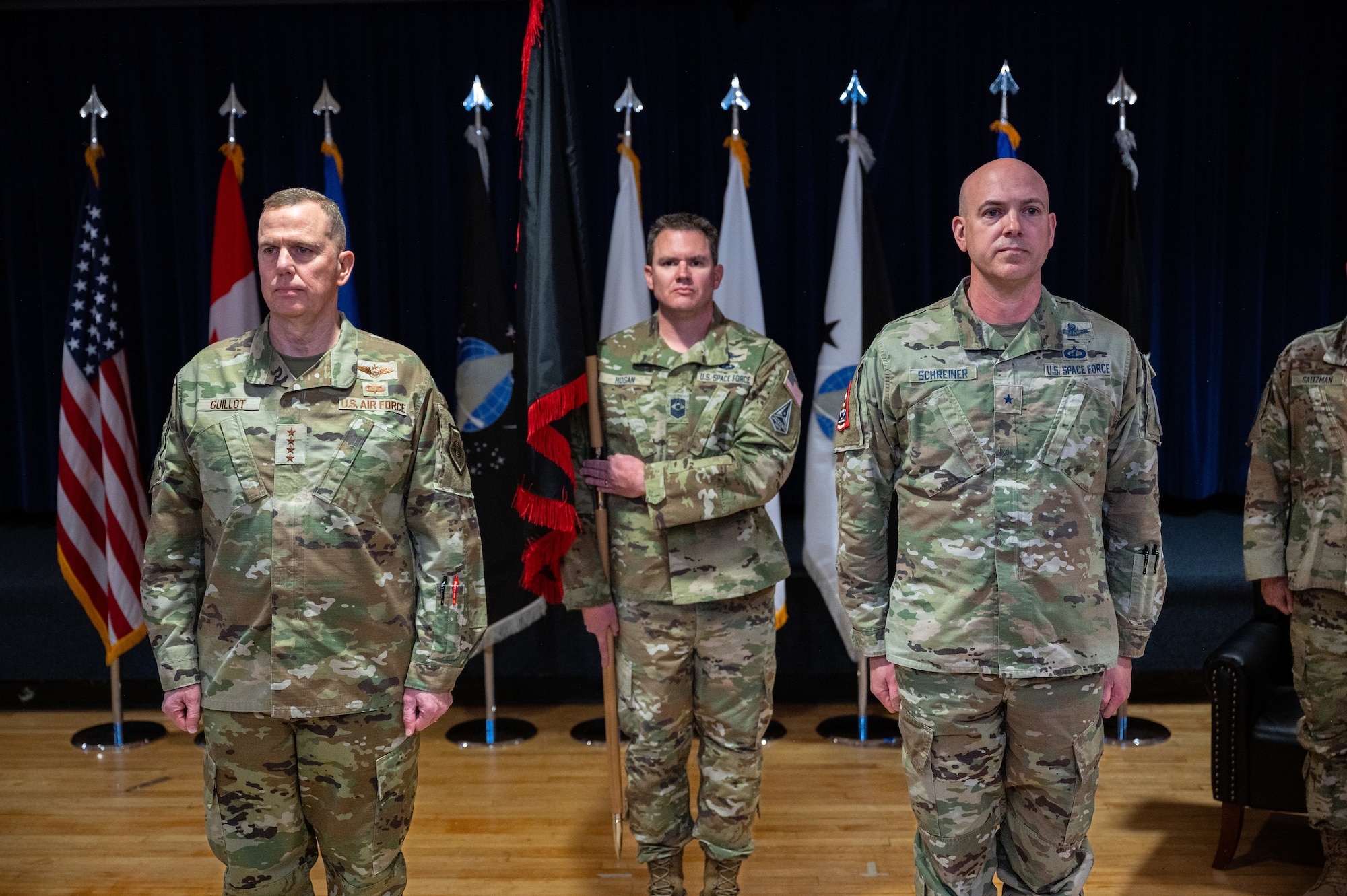Gen. Gregory Guillot, North American Aerospace Defense Command and U.S. Northern Command commander and Brig. Gen. Robert Schreiner, SPACEFOR-NORTH commander stands at attention prior to Schreiner taking command during the SPACEFOR-NORTH activation ceremony at Peterson SFB, Colo., Jan 30, 2026. U.S. Space Forces Northern, serves as the Space Force service component to U.S. Northern Command. (U.S. Space Force photo by John Ayre)
