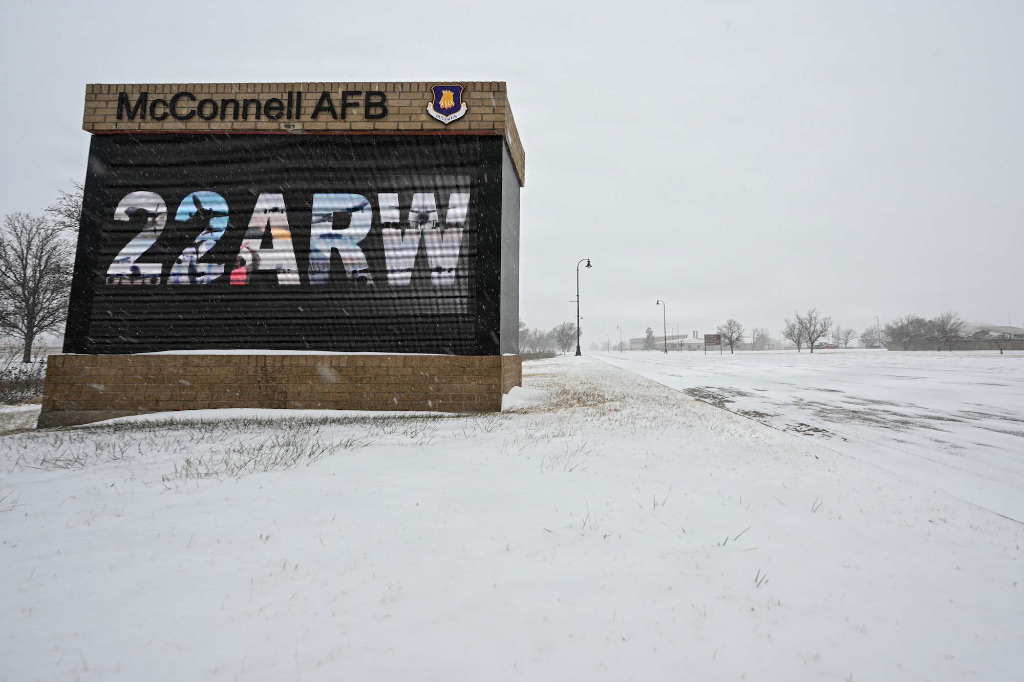 Snowfall accumulates at McConnell Air Force Base, Kansas, Jan. 24, 2026. Road conditions continued to worsen as a snow storm passed through Wichita. (U.S. Air Force photo by Senior Airman Amelio Brown)