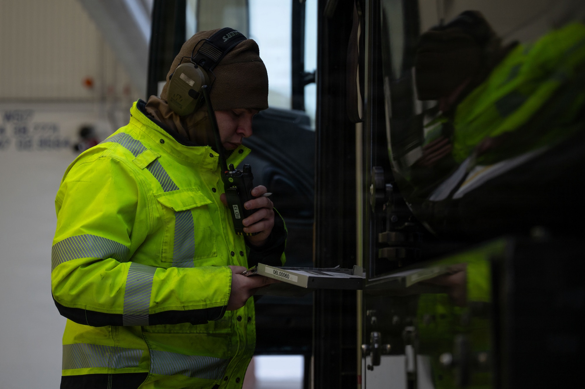 U.S. Air Force Airman 1st Class Timothy King, 354th Logistics Readiness Squadron fuels distribution operator, writes a receipt for a crew chief at Eielson Air Force Base, Alaska, Jan. 26, 2026.