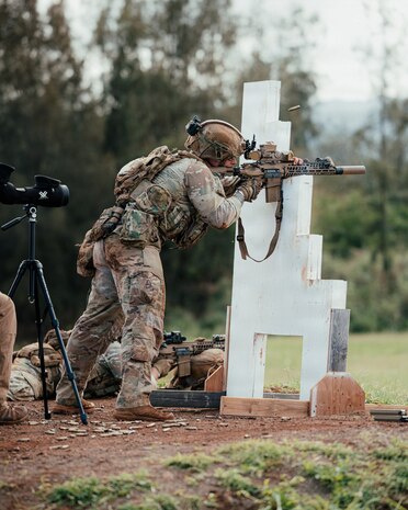 A Soldier assigned to the 25th Infantry Division engages targets from a supported firing position during M7 rifle training at Schofield Barracks, Hawaii, Jan. 24, 2026.