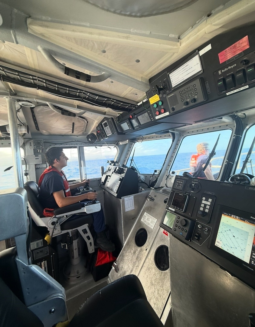U.S. Coast Guard Fireman Jared Delalcazar and Petty Officer 2nd Class Tucker Pittman, two deck department members assigned to Coast Guard Station Kauai in Lihue, Hawaii, use a Station Kauai 45-foot Response Boat-Medium to conduct search patterns to search for a man in the water off the north shore of Kauai Jan. 30, 2026. Coast Guard and agency partners are searching for a man in the water who was swept off the rocks while fishing near Kahili Beach. (U.S. Coast Guard photo, courtesy Station Kauai)