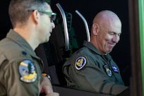 Lt. Gen. Clark Quinn, Air Education and Training Command commander, receives T-7 training from Lt. Col. Jonathan Aronoff, 416th Flight Test Squadron T-7 lead test pilot