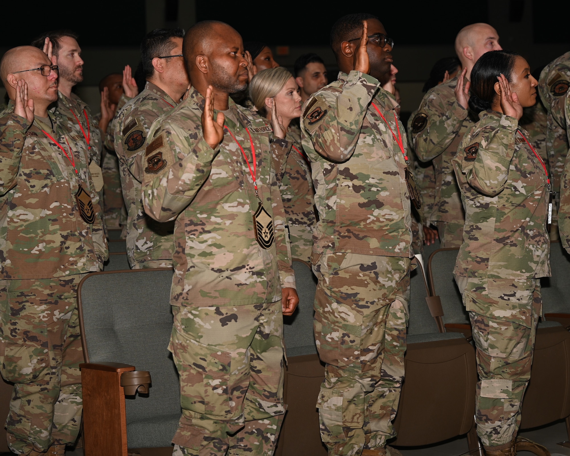 Airmen from the 459th ARW raise their right hands as they recite the official Senior NCO charge during the wing's Senior NCO Induction Ceremony held at the 459th during its January UTA weekend. (U.S. Air Force photo by Senior Airman Alexcia Givens).