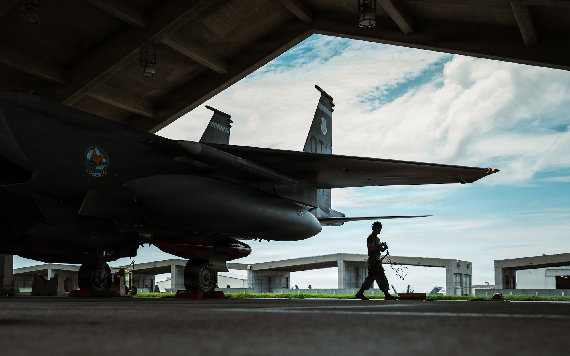 A U.S. Air Force 67th Fighter Generation Squadron crew chief communicates with an F-15EX Eagle II pilot following its arrival at Kadena Air Base, Japan, June 29, 2026.