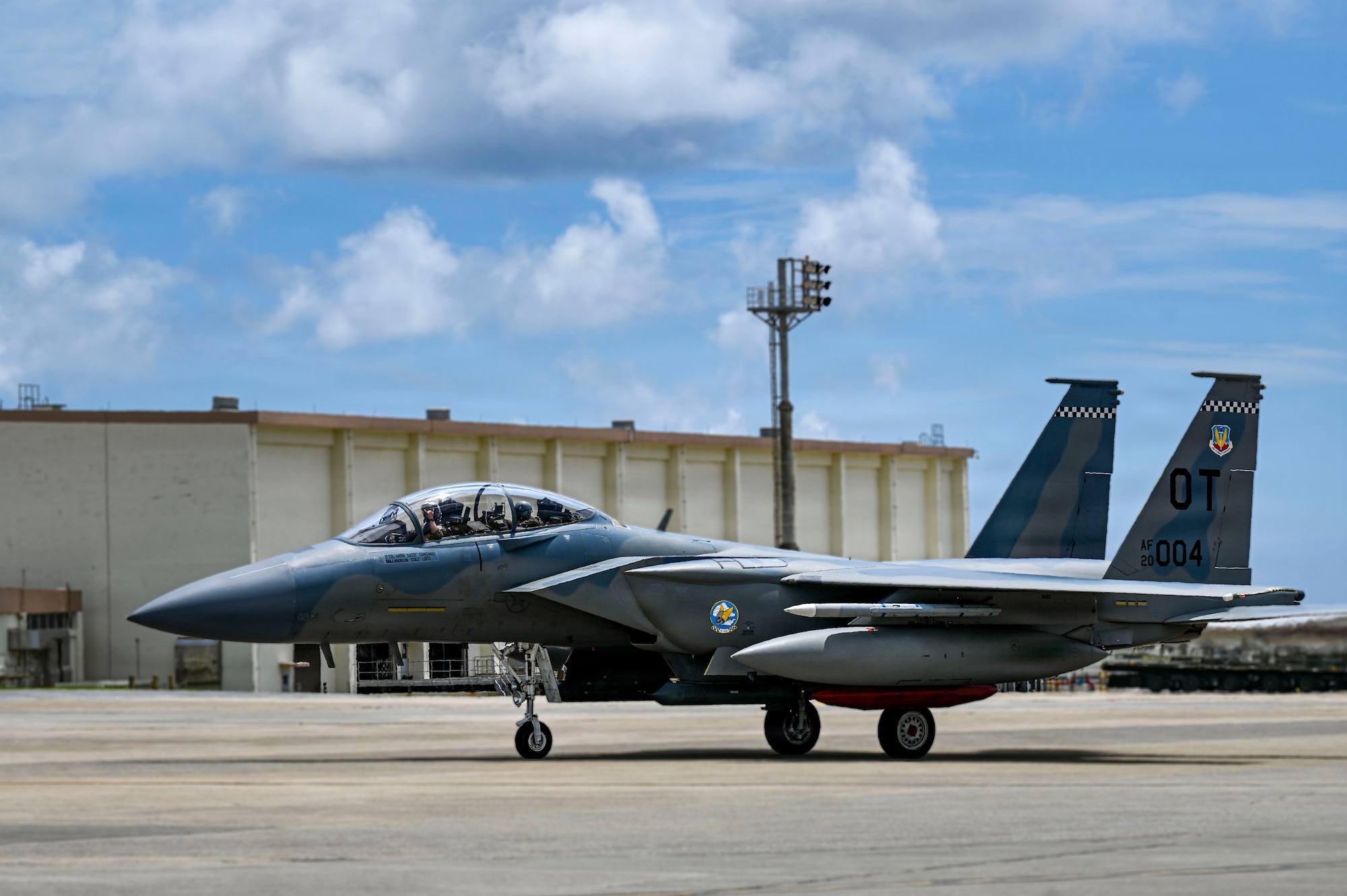 An F-15EX taxi's on a runway at Kadena Air Base
