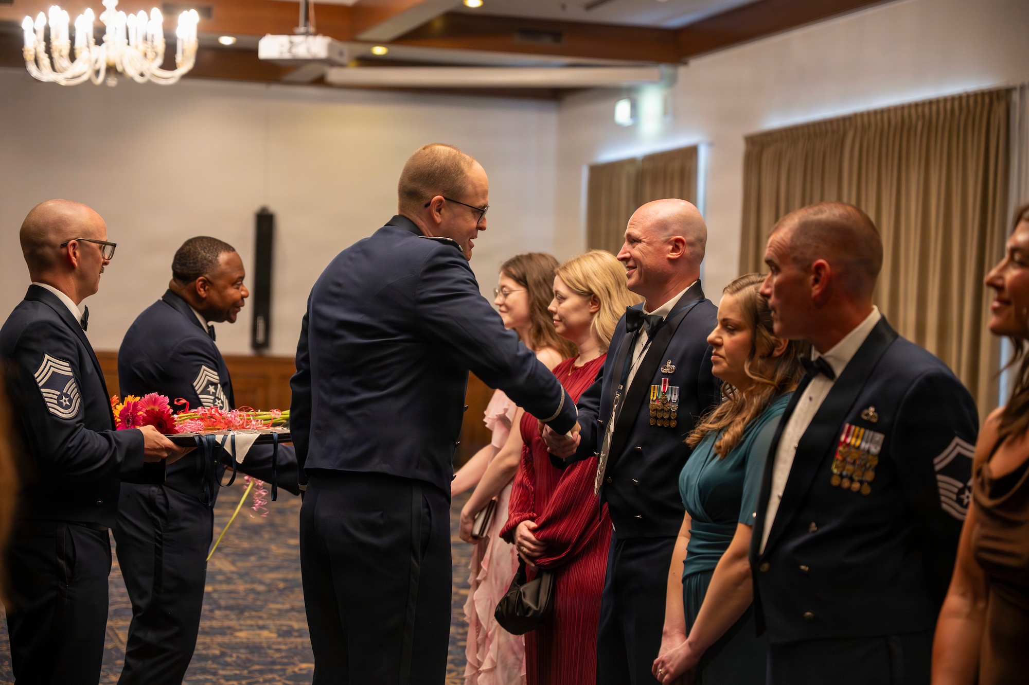 A photo of Airmen shaking hands