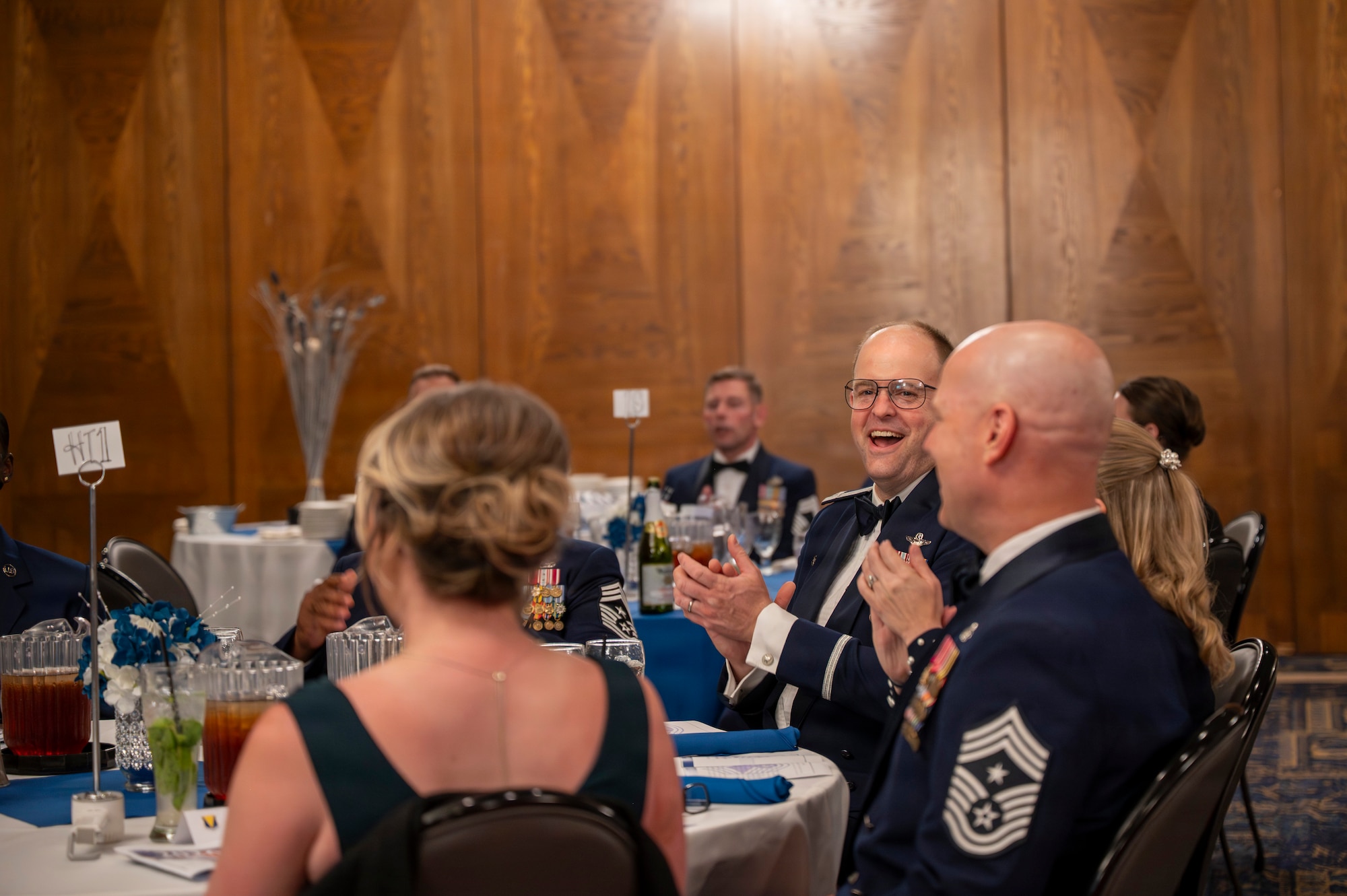 A photo of an Airman celebrating during a ceremony