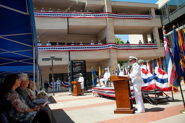Capt. Jerry J. Bailey, director of Naval Medical Center San Diego (NMCSD), delivers remarks after assuming the duties as director during the Navy Medicine Readiness and Training Command (NMRTC) San Diego change of command and Naval Medical Center San Diego (NMCSD) transfer of directorship ceremony at NMCSD, June 30, 2026. Bailey assumed leadership of NMCSD following the transfer of directorship from Capt. Elizabeth Adriano. NMRTC San Diego supports Navy and Marine Corps readiness by ensuring its medical forces are ready to deploy and provide medical support, ashore or at sea. The mission of NMCSD is to optimize health and enhance readiness. NMCSD employs more than 5,500 active-duty military personnel, civilians, and contractors in southern California to deliver exceptional care afloat and ashore. (U.S. Navy photo by Mass Communication Specialist 1st Class Marcus Stanley)