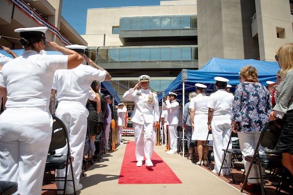 Capt. Jerry J. Bailey, director of Naval Medical Center San Diego (NMCSD), departs after assuming the duties as director during the Navy Medicine Readiness and Training Command (NMRTC) San Diego change of command and NMCSD transfer of directorship ceremony at the hospital, June 30, 2026. Bailey assumed leadership of NMCSD following the transfer of directorship from Capt. Elizabeth Adriano. NMRTC San Diego supports Navy and Marine Corps readiness by ensuring its medical forces are ready to deploy and provide medical support, ashore or at sea. The mission of NMCSD is to optimize health and enhance readiness. NMCSD employs more than 5,500 active-duty military personnel, civilians, and contractors in southern California to deliver exceptional care afloat and ashore. (U.S. Navy photo by Mass Communication Specialist 1st Class Marcus Stanley)