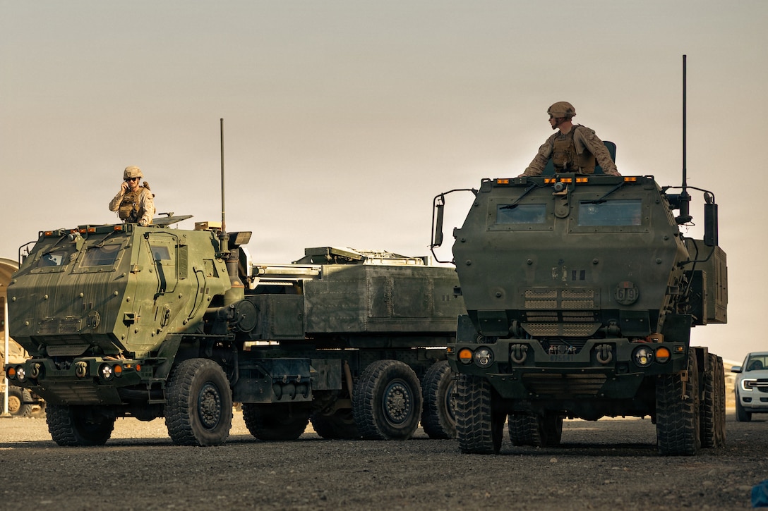 U.S. Marines form a convoy of M142 High Mobility Artillery Rocket Systems when departing to a Position Area for Artillery in the U.S. Central Command area of responsibility, June 16, 2026. Maneuvering to a PAA allows Marine Corps artillery batteries to deliver rapid, long-range fire support to ground and maneuver forces in a designated area of responsibility. (U.S. Marine Corps photo illustration by Sgt. Antonino Mazzamuto)