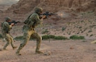 U.S. Army paratroopers conduct small arms training with the M4 carbine during a live-fire range in the Middle East. Such training helps Soldiers improve weapons proficiency, accuracy, and weapons handling skills in a variety of conditions. (U.S. Army photo)
