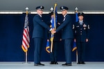 Lt. Gen. Jefferson O’Donnell, Deputy Chief of Staff for Manpower, Personnel, and Services, passes the Air Force Personnel Center guidon to incoming commander, U.S. Air Force Brig. Gen. Ryan Richardson, during the assumption of command and change of responsibility ceremony on Joint Base San Antonio-Randolph, June 30, 2026. The passing of the guidon symbolizes the formal transfer of authority to Richardson as commander of the Air Force Personnel Center. (U.S. Air Force photo by Airman 1st Class Kevin Prashad)
