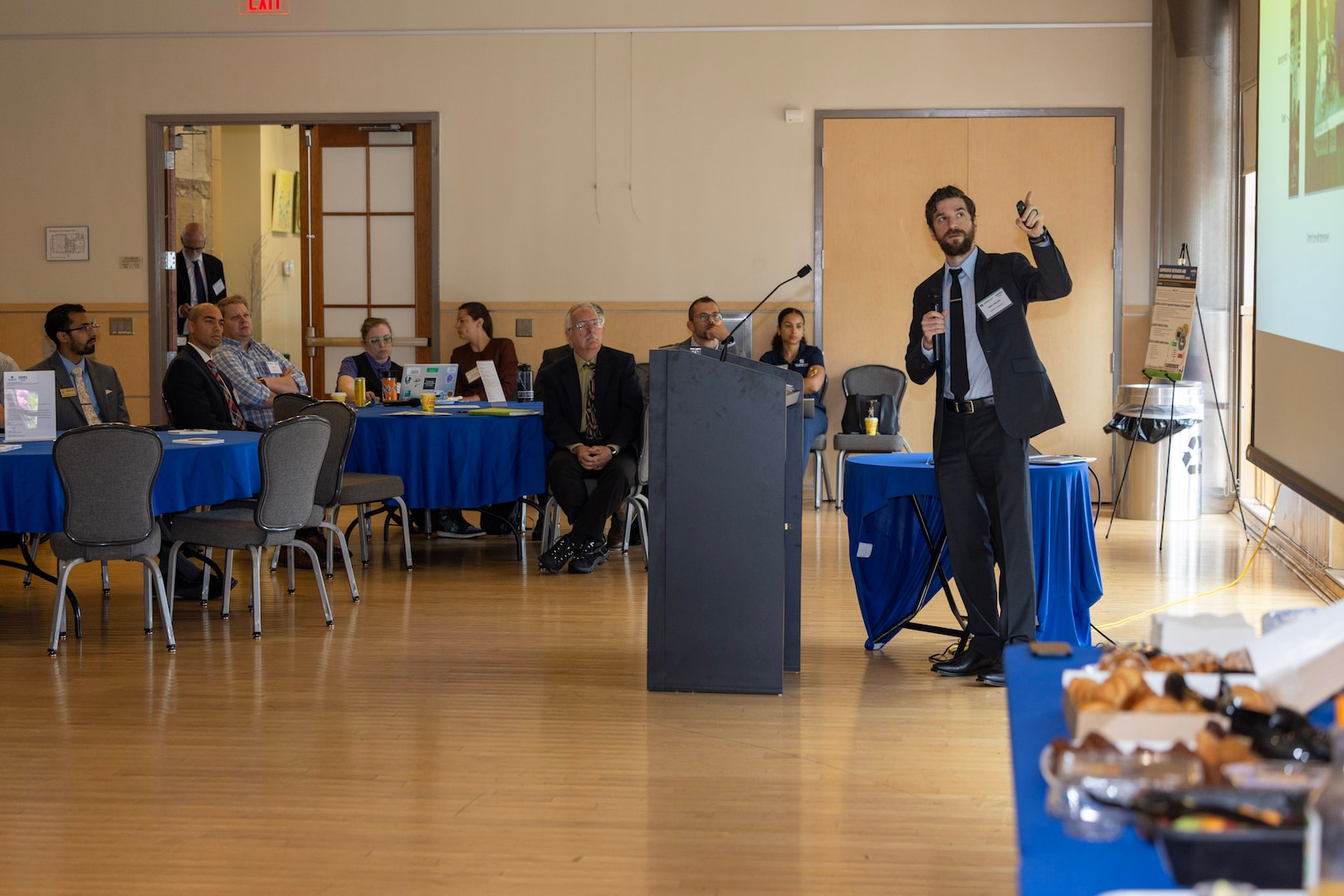 Engineer Nikko Miniello presents patented technology to industry and academic partners during Carderock's Sensors & Autonomy Reverse Pitch Day.