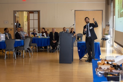 Engineer Nikko Miniello presents patented technology to industry and academic partners during Carderock's Sensors & Autonomy Reverse Pitch Day.