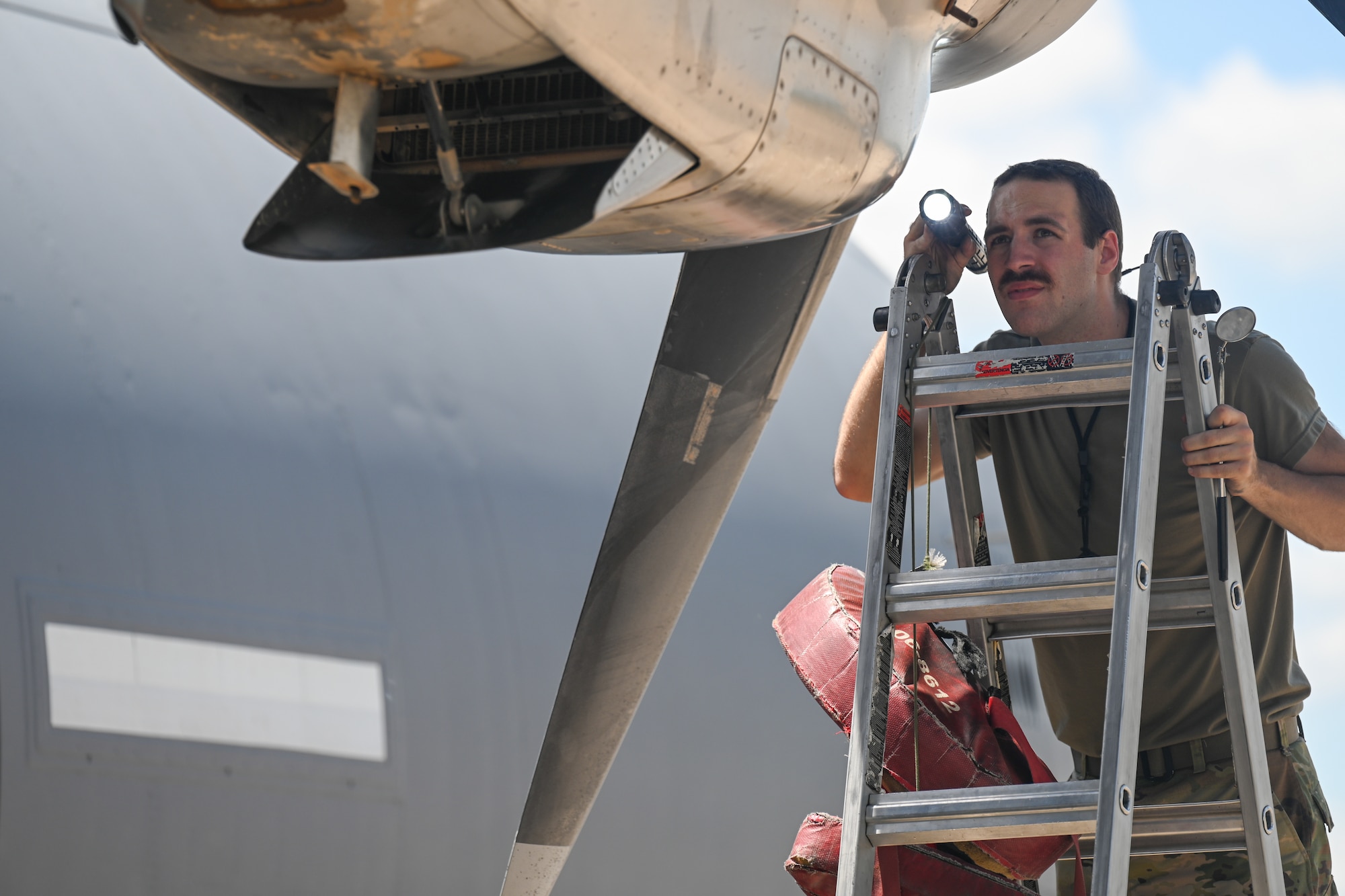 An Airman works on an aircraft.