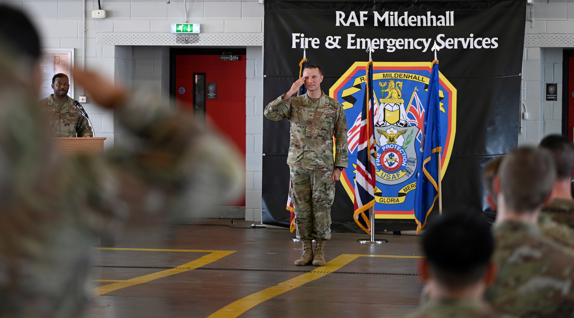 U.S. Air Force Col. Brandon Bernardoni, 100th Mission Support Group commander, renders his first salute to 100th MSG Airmen during a change of command ceremony at RAF Mildenhall, England, June 26, 2026. Bernardoni joins Team Mildenhall after his previous assignment as a Joint Planner at U.S. European Command in the War Plans Division at Stuttgart, Germany. The change of command ceremony is a time-honored tradition in which one officer relinquishes command and passes it to another. (U.S. Air Force photo by Karen Abeyasekere)