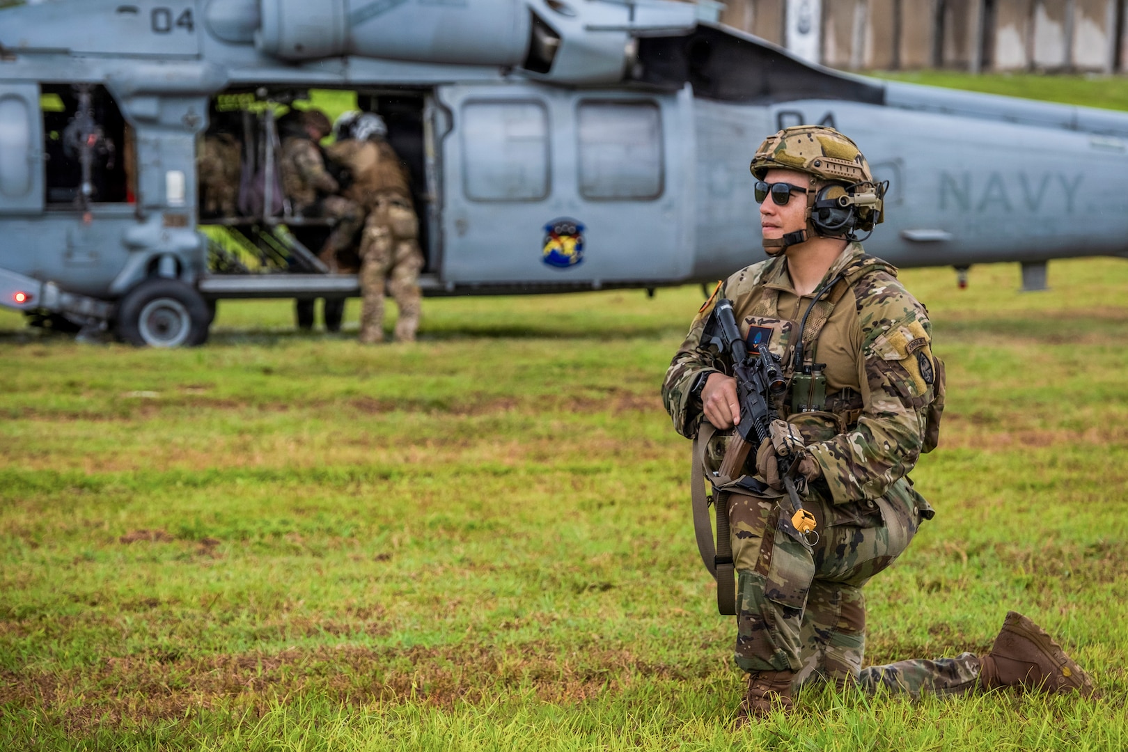U.S. Army Sgt. 1st Class Alan San Nicolas of the Guam National Guard, assigned to Task Force Talon, 38th Air Defense Artillery Brigade, pulls security for a U.S. Navy SH-60 Seahawk during a joint medical evacuation and Air Assault tactical training event on Guam, May 26, 2026.