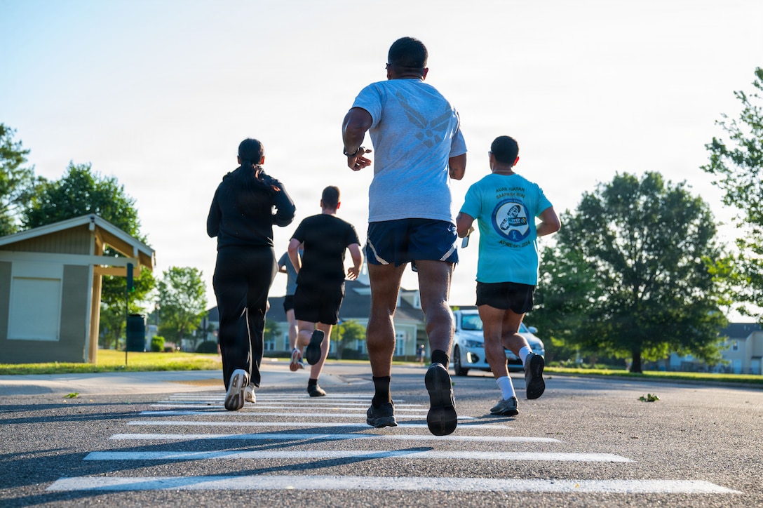 U.S. Airmen assigned to the 316th Civil Engineer Squadron conduct a 5K run.