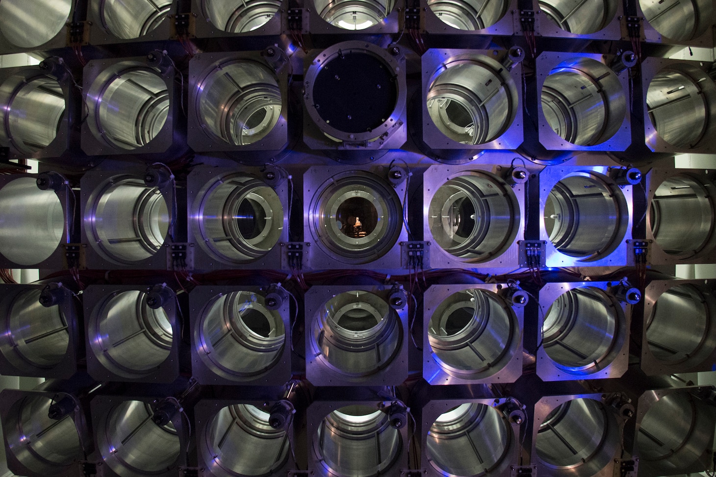 NRL Nike Laser Achieves Spot in Guinness World Records; A set of experiments conducted on the Nike krypton fluoride (KrF) laser at the U.S. Naval Research Laboratory (NRL) nearly five years ago has, at long last, earned the coveted Guinness World Records title for achieving “Highest Projectile Velocity” of greater than 1,000 kilometers per second (km/s), a speed equivalent to two-and-a-quarter million miles per hour. Images of the Nike laser facility - the world's highest energy KrF
laser, and of the team that helped achieve record highest projectile velocity. (U.S. Navy photo by Jamie Hartman) RELEASED