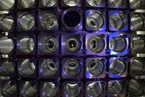 NRL Nike Laser Achieves Spot in Guinness World Records; A set of experiments conducted on the Nike krypton fluoride (KrF) laser at the U.S. Naval Research Laboratory (NRL) nearly five years ago has, at long last, earned the coveted Guinness World Records title for achieving “Highest Projectile Velocity” of greater than 1,000 kilometers per second (km/s), a speed equivalent to two-and-a-quarter million miles per hour. Images of the Nike laser facility - the world's highest energy KrF
laser, and of the team that helped achieve record highest projectile velocity. (U.S. Navy photo by Jamie Hartman) RELEASED