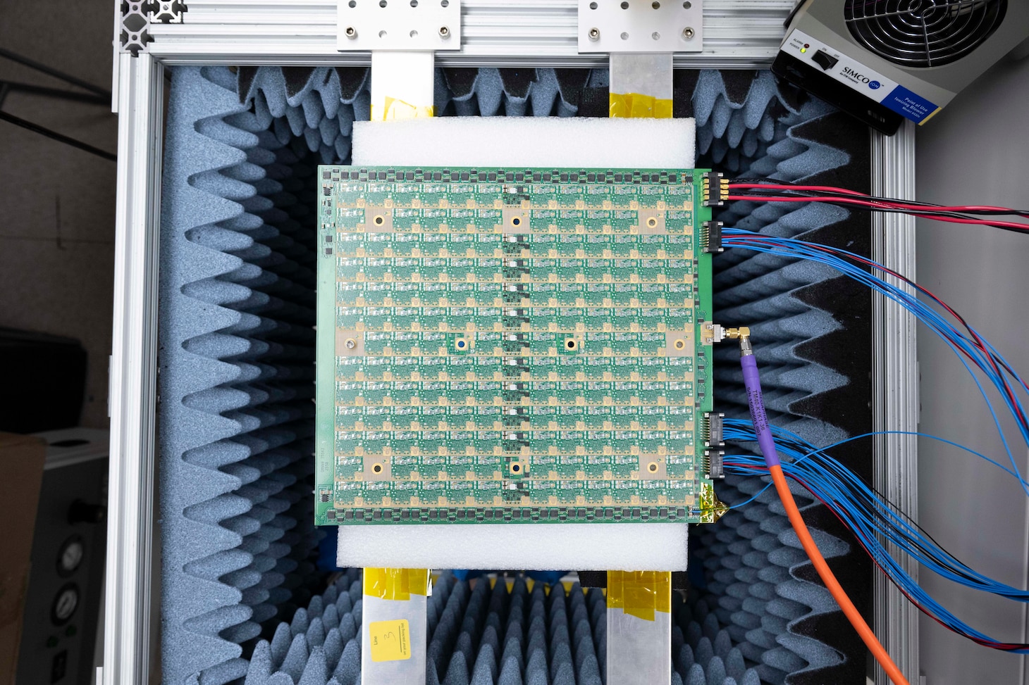 A U.S. Naval Research Laboratory (NRL) X-band gallium nitride phased array awaits testing in Washington, D.C., March 23, 2026. The NRL designed device converts solar energy to a focused microwave beam with unprecedented conversion efficiency and has power beaming applications to provide warfighters with continuous electrical power anywhere at any time. (U.S. Navy photo by Sarah Peterson) RELEASED