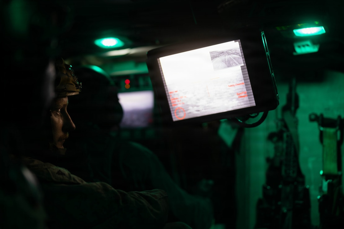 U.S. Marines Corps Lance Cpl. Hudson Helget, a vehicle gunner with Echo Company, 3d Assault Amphibian Battalion, 1st Marine Division, monitors targets during a live-fire range at Marine Corps Air-Ground Combat Center Twentynine Palms California, June 24, 2026.